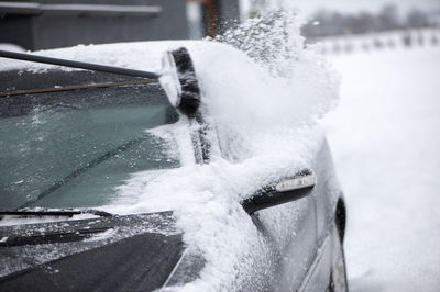 Close-up of frozen car