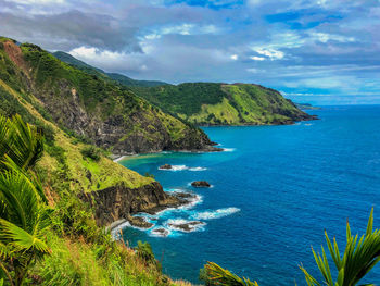 Scenic view of bay against sky