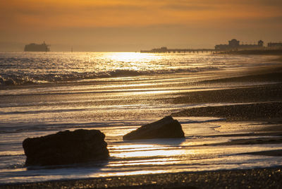 Scenic view of sea against sky during sunset