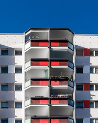 Low angle view of building against clear blue sky