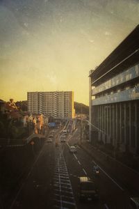 Road in city at sunset