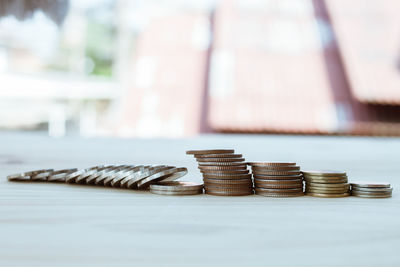 Close-up of coins on table