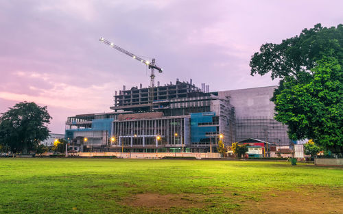 View of buildings in city against sky