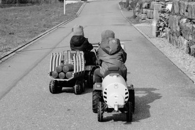 Man riding motorcycle on road
