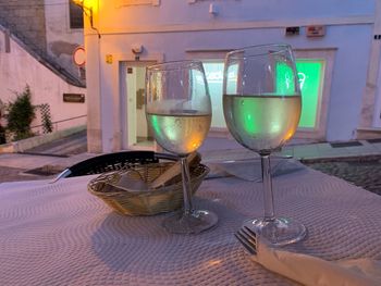 Wine glasses on table at restaurant