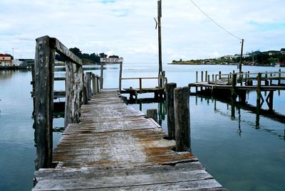 Pier over sea against sky