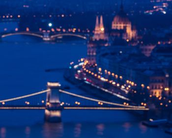 Aerial view of suspension bridge at night