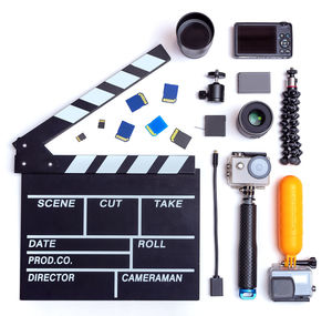 High angle view of camera on table against white background