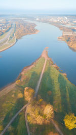 High angle view of road by sea against sky