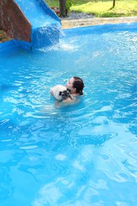 Portrait of woman swimming in pool