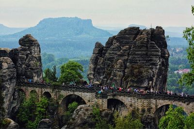 View of bridge against cloudy sky