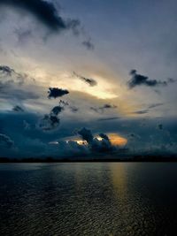 Scenic view of sea against sky at sunset