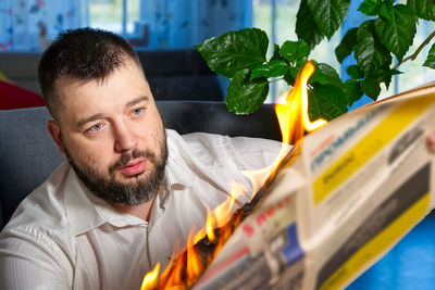 Portrait of man on plant