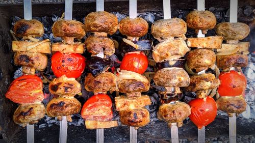 Close-up of pumpkins on barbecue grill