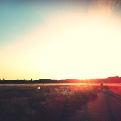 Scenic view of landscape at sunset