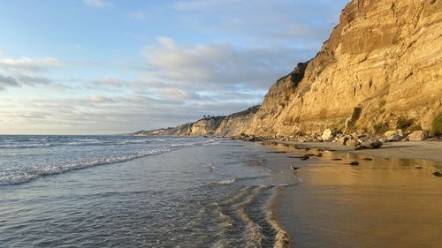 Scenic view of beach against sky