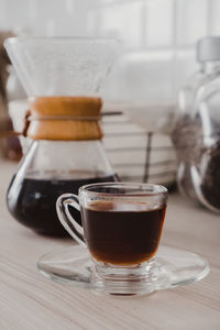 Close-up of coffee cup on table