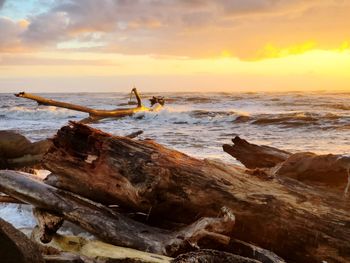 Scenic view of sea against sky during sunset