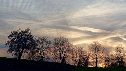 Scenic view of landscape against cloudy sky