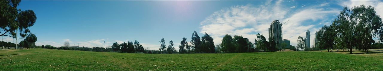 Scenic view of landscape against cloudy sky