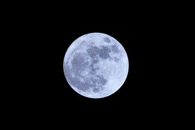 Full moon against clear sky at night