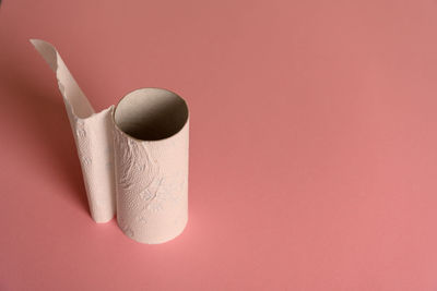 High angle view of pink umbrella on table