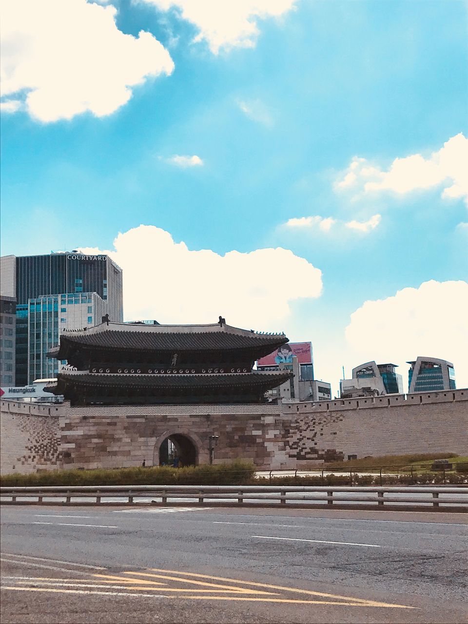 sky, built structure, building exterior, architecture, cloud - sky, transportation, city, road, nature, street, no people, day, outdoors, mode of transportation, building, symbol, sunlight, travel, sign, industry