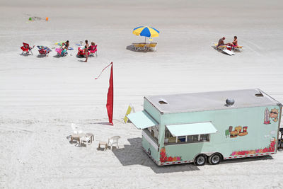 Travelling food caravan on beach