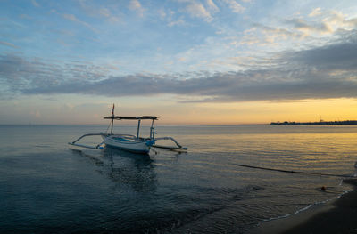 Fisherman traditional boats at lovina beach, bali, indonesia.