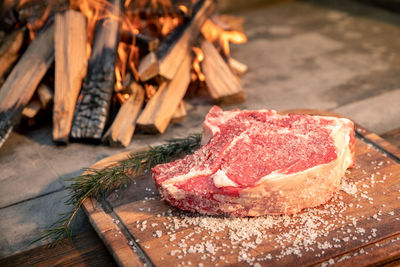 Italian steak ready to be cooked on a barbecue. appetizing piece of meat ready to be set on bbq fire
