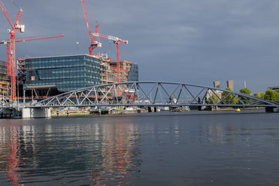 Bridge over river against sky