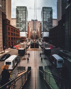 Reflections of buildings on glass in city