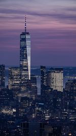 Modern buildings in city at night