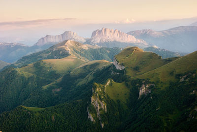 Scenic view of mountains against sky during sunset