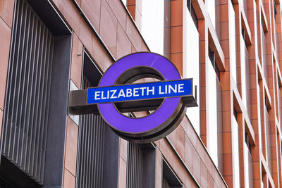 Elizabeth line london sign on modern building exterior. london, uk, 14 april 2024