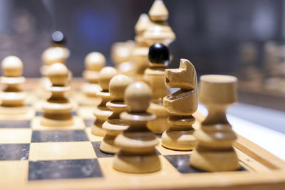 Close-up of chess pieces on board