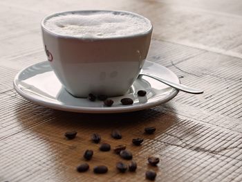 Close-up of coffee in cup on table