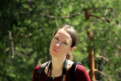 Portrait of a young woman looking away