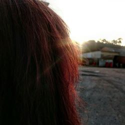 Close-up of woman against sky