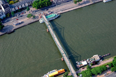 High angle view of harbor by river in city