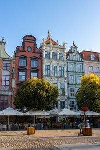 View of buildings against blue sky