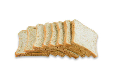 Directly above shot of bread against white background