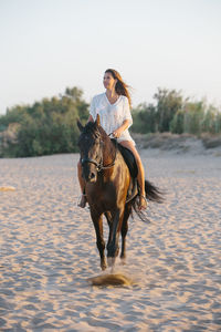 Man riding horse