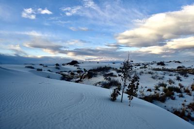 Scenic view of snow covered mountain against sky