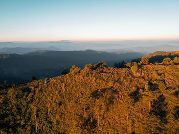 Scenic view of landscape against sky during sunset