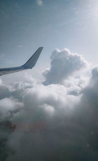 Low angle view of airplane flying in sky