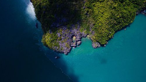 Aerial view of mountain by sea