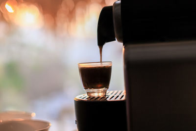 Close-up of coffee cup on table