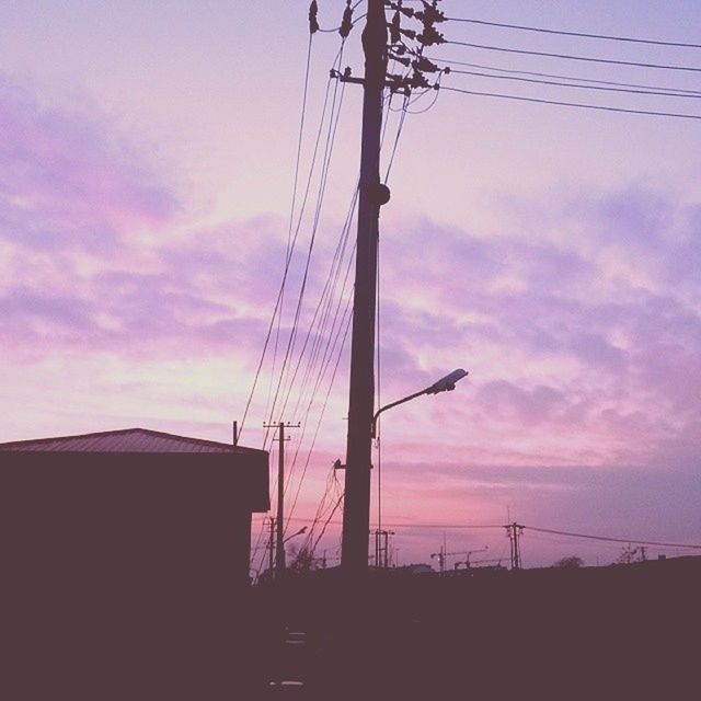 electricity pylon, power line, power supply, electricity, fuel and power generation, connection, cable, sky, sunset, silhouette, technology, low angle view, cloud - sky, cloud, power cable, electricity tower, cloudy, dusk, outdoors, no people