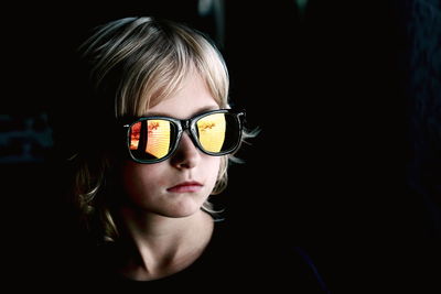 Close-up of boy wearing sunglass